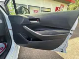 2023 Toyota Corolla Touring 1.8 Hybrid G ​​E-Four 4WD White Van for sale, Japanese used car export - photo 42 of 50 | GULJI TRADERS