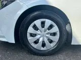 2023 Toyota Corolla Touring 1.8 Hybrid G ​​E-Four 4WD White Van for sale, Japanese used car export - photo 46 of 50 | GULJI TRADERS