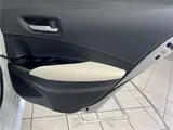 2023 Toyota Corolla Touring Hybrid Double By Pearl Van for sale, Japanese used car export - photo 11 of 30 | GULJI TRADERS