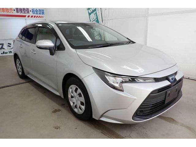 2023 Toyota Corolla Touring Hybrid X Van for sale, Japanese used car export - photo 1 of 32 | GULJI TRADERS