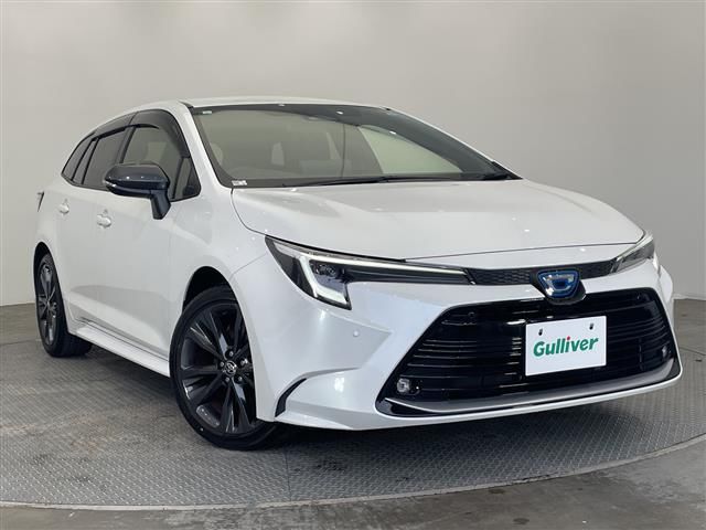 2023 Toyota Corolla Touring Hybrid - photo 1 2023 Toyota Corolla Touring Hybrid Van for sale, Japanese used car export - photo 1 of 24 | GULJI TRADERS