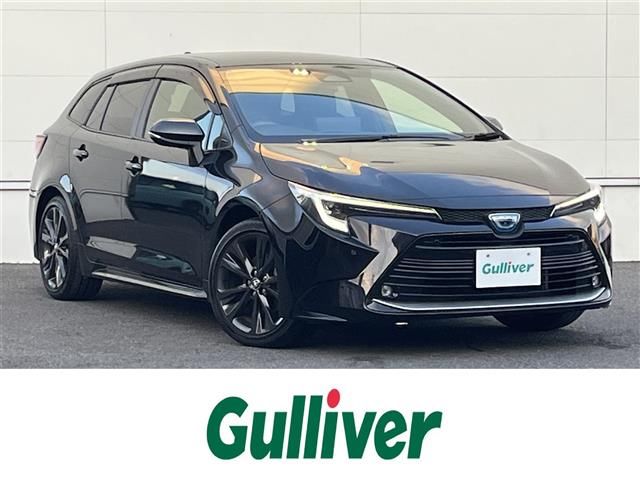 2023 Toyota Corolla Touring Hybrid Van for sale, Japanese used car export - photo 1 of 24 | GULJI TRADERS