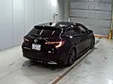 2023 Toyota Corolla Touring Hybrid Double WxB Modellista Black Van for sale, Japanese used car export - photo 2 of 5 | GULJI TRADERS