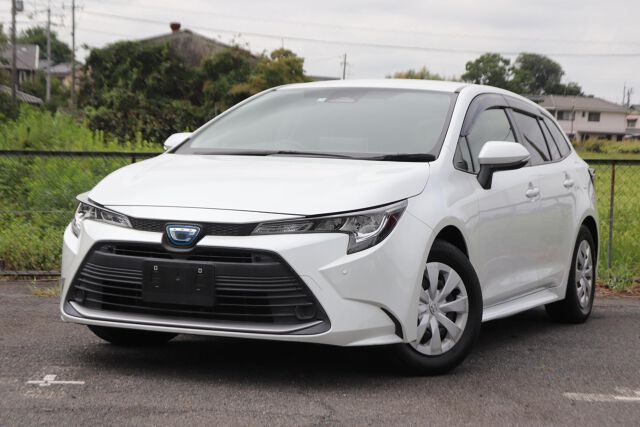 2023 Toyota Corolla Touring Hybrid G - photo 1 2023 Toyota Corolla Touring Hybrid G Van for sale, Japanese used car export - photo 1 of 7 | GULJI TRADERS