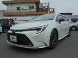2023 Toyota Corolla Touring 1.8 HYBRID WxB Pearl Van for sale, Japanese used car export - photo 1 of 30 | GULJI TRADERS