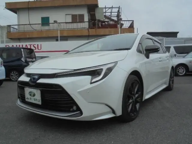 2023 Toyota Corolla Touring 1.8 HYBRID WxB - photo 1 2023 Toyota Corolla Touring 1.8 HYBRID WxB Pearl Van for sale, Japanese used car export - photo 1 of 30 | GULJI TRADERS