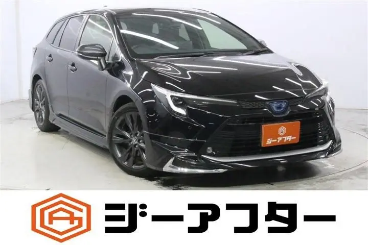 2023 Toyota Corolla Touring 1.8 HYBRID WxB - photo 1 2023 Toyota Corolla Touring 1.8 HYBRID WxB Black Van for sale, Japanese used car export - photo 1 of 30 | GULJI TRADERS