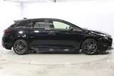 2023 Toyota Corolla Touring 1.8 HYBRID WxB Black Van for sale, Japanese used car export - photo 4 of 30 | GULJI TRADERS