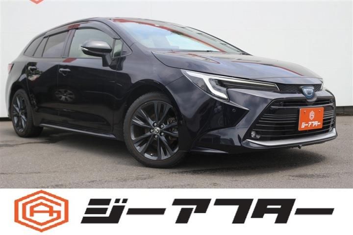 2023 Toyota Corolla Touring 1.8 HYBRID WxB 4WD Van for sale, Japanese used car export - photo 1 of 30 | GULJI TRADERS