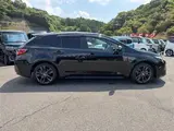 2023 Toyota Corolla Touring 1.8HV WxB Pure 10.5 Type D Nahi Black Van for sale, Japanese used car export - photo 10 of 30 | GULJI TRADERS