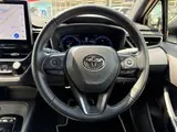 2023 Toyota Corolla Touring 1.8HV WxB Pure 10.5 Type D Nahi Black Van for sale, Japanese used car export - photo 18 of 30 | GULJI TRADERS