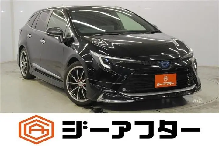 2023 Toyota Corolla Touring 1.8 HYBRID WxB - photo 1 2023 Toyota Corolla Touring 1.8 HYBRID WxB Black Van for sale, Japanese used car export - photo 1 of 30 | GULJI TRADERS
