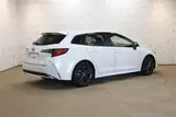 2023 Toyota Corolla Touring HYBRID WxB Pearl Van for sale, Japanese used car export - photo 26 of 30 | GULJI TRADERS