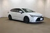 2023 Toyota Corolla Touring HYBRID WxB Pearl Van for sale, Japanese used car export - photo 28 of 30 | GULJI TRADERS