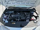 2023 Toyota Corolla Touring 1.8 HYBRID WxB Pearl Van for sale, Japanese used car export - photo 22 of 23 | GULJI TRADERS