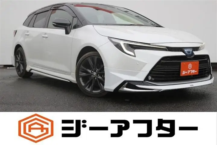 2023 Toyota Corolla Touring 1.8 HYBRID WxB - photo 1 2023 Toyota Corolla Touring 1.8 HYBRID WxB Black Van for sale, Japanese used car export - photo 1 of 30 | GULJI TRADERS