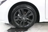 2023 Toyota Corolla Touring 1.8 HYBRID WxB White Van for sale, Japanese used car export - photo 25 of 30 | GULJI TRADERS