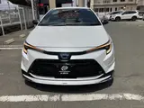 2023 Toyota Corolla Touring W×B (Hybrid Vehicle) 4WD Pearl Van for sale, Japanese used car export - photo 2 of 24 | GULJI TRADERS