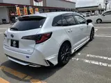 2023 Toyota Corolla Touring W×B (Hybrid Vehicle) 4WD Pearl Van for sale, Japanese used car export - photo 6 of 24 | GULJI TRADERS