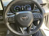 2023 Toyota Corolla Touring W×B (Hybrid Vehicle) 4WD Pearl Van for sale, Japanese used car export - photo 11 of 24 | GULJI TRADERS