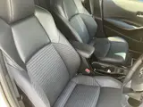 2023 Toyota Corolla Touring W×B (Hybrid Vehicle) 4WD Pearl Van for sale, Japanese used car export - photo 23 of 24 | GULJI TRADERS