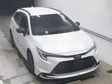 2023 Toyota Corolla Touring HYBRID WXB Pearl Van for sale, Japanese used car export - photo 1 of 2 | GULJI TRADERS