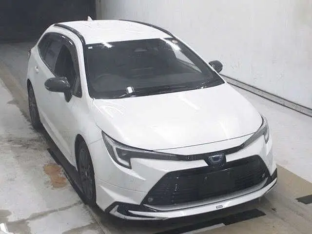 2023 Toyota Corolla Touring HYBRID WXB Pearl Van for sale, Japanese used car export - photo 1 of 2 | GULJI TRADERS