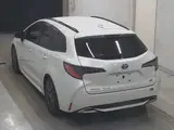 2023 Toyota Corolla Touring HYBRID WXB Pearl Van for sale, Japanese used car export - photo 2 of 2 | GULJI TRADERS