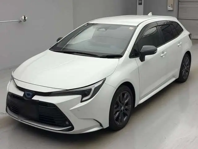 2023 Toyota Corolla Touring Hybrid Double By - photo 1 2023 Toyota Corolla Touring Hybrid Double By Pearl Van for sale, Japanese used car export - photo 1 of 15 | GULJI TRADERS