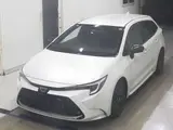 2023 Toyota Corolla Touring HYBRID WXB Pearl Van for sale, Japanese used car export - photo 4 of 7 | GULJI TRADERS
