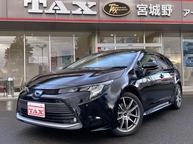 2023 Toyota Corolla Touring 1.8 Hybrid G E-Four 4WD - photo 1 2023 Toyota Corolla Touring 1.8 Hybrid G E-Four 4WD Black Van for sale, Japanese used car export - photo 1 of 17 | GULJI TRADERS
