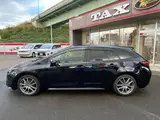 2023 Toyota Corolla Touring 1.8 Hybrid G ​​E-Four 4WD Black Van for sale, Japanese used car export - photo 10 of 17 | GULJI TRADERS