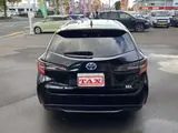 2023 Toyota Corolla Touring 1.8 Hybrid G ​​E-Four 4WD Black Van for sale, Japanese used car export - photo 12 of 17 | GULJI TRADERS