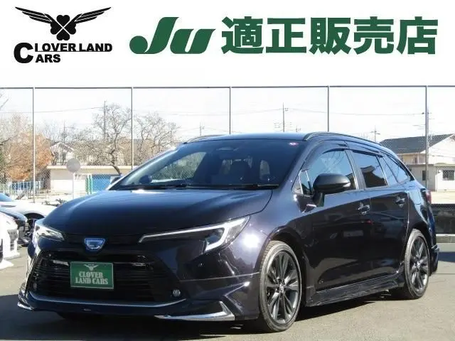 2023 Toyota Corolla Touring 1.8 Hybrid WxB E-Four 4WD - photo 1 2023 Toyota Corolla Touring 1.8 Hybrid WxB E-Four 4WD Other Van for sale, Japanese used car export - photo 1 of 19 | GULJI TRADERS