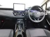 2023 Toyota Corolla Touring 1.8 Hybrid WxB E-Four 4WD Pearl Van for sale, Japanese used car export - photo 4 of 20 | GULJI TRADERS