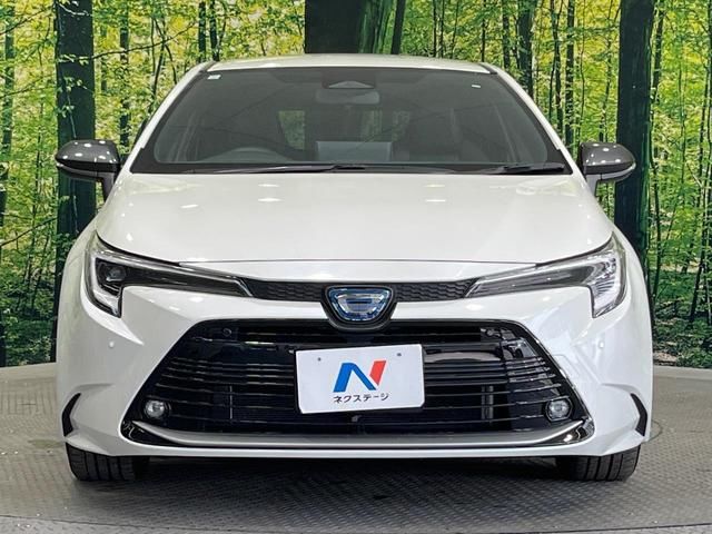 2023 Toyota Corolla Touring Hybrid - photo 1 2023 Toyota Corolla Touring Hybrid Van for sale, Japanese used car export - photo 1 of 24 | GULJI TRADERS
