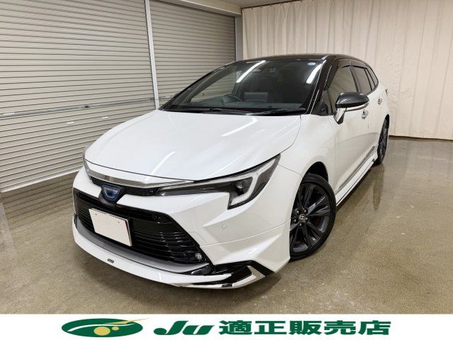 2023 Toyota Corolla Touring 4WD Hybrid Van for sale, Japanese used car export - photo 1 of 24 | GULJI TRADERS
