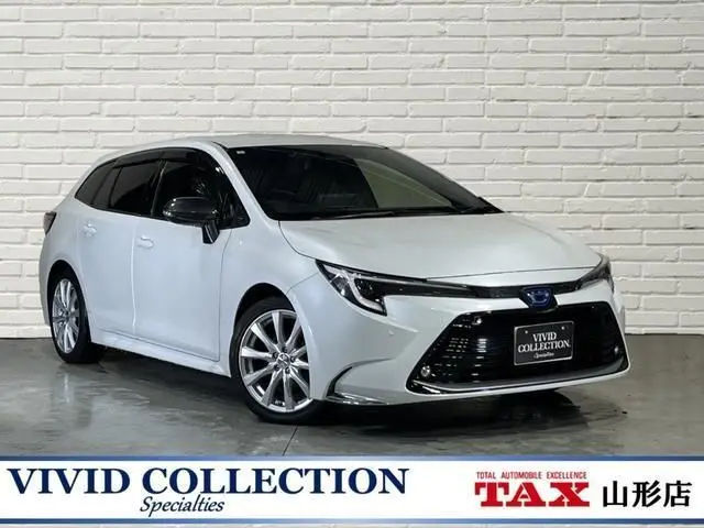 2023 Toyota Corolla Touring Hybrid Double B Pearl Van for sale, Japanese used car export - photo 1 of 9 | GULJI TRADERS