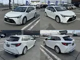 2023 Toyota Corolla Touring Hybrid Double B Pearl Van for sale, Japanese used car export - photo 2 of 9 | GULJI TRADERS