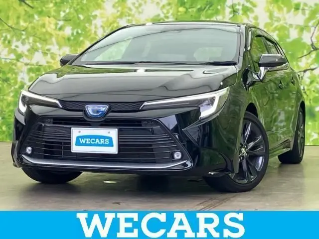 2023 Toyota Corolla Touring 4WD Hybrid Double Bar - photo 1 2023 Toyota Corolla Touring 4WD Hybrid Double Bar Black Van for sale, Japanese used car export - photo 1 of 9 | GULJI TRADERS