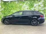 2023 Toyota Corolla Touring 4WD Hybrid Double Bar Black Van for sale, Japanese used car export - photo 2 of 9 | GULJI TRADERS