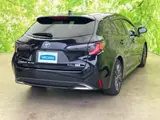 2023 Toyota Corolla Touring 4WD Hybrid Double Bar Black Van for sale, Japanese used car export - photo 3 of 9 | GULJI TRADERS