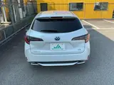 2023 Toyota Corolla Touring 1.8 Hybrid WxB White Van for sale, Japanese used car export - photo 2 of 9 | GULJI TRADERS