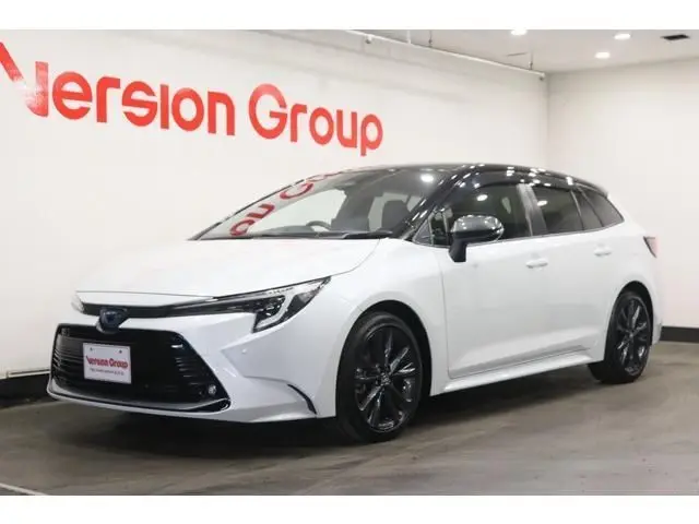 2023 Toyota Corolla Touring Hybrid Double By - photo 1 2023 Toyota Corolla Touring Hybrid Double By Black Van for sale, Japanese used car export - photo 1 of 9 | GULJI TRADERS