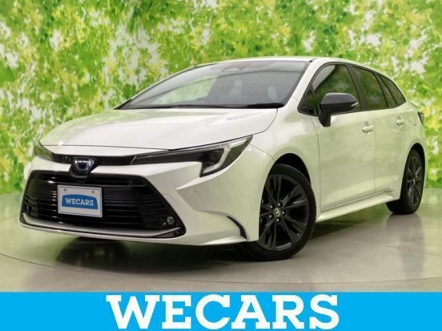 2023 Toyota Corolla Touring Hybrid - photo 1 2023 Toyota Corolla Touring Hybrid Van for sale, Japanese used car export - photo 1 of 9 | GULJI TRADERS
