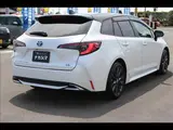 2024 Toyota Corolla Touring W×B (Hybrid) with vehicle inspection and maintenance included. Black Van for sale, Japanese used car export - photo 2 of 20 | GULJI TRADERS