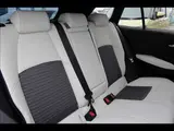 2024 Toyota Corolla Touring W×B (Hybrid) with vehicle inspection and maintenance included. Black Van for sale, Japanese used car export - photo 10 of 20 | GULJI TRADERS