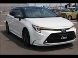 2024 Toyota Corolla Touring W×B (Hybrid) with vehicle inspection and maintenance included. Black Van for sale, Japanese used car export - photo 14 of 20 | GULJI TRADERS