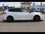 2024 Toyota Corolla Touring W×B (Hybrid) with vehicle inspection and maintenance included. Black Van for sale, Japanese used car export - photo 15 of 20 | GULJI TRADERS