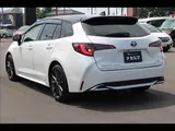 2024 Toyota Corolla Touring W×B (Hybrid) with vehicle inspection and maintenance included. Black Van for sale, Japanese used car export - photo 18 of 20 | GULJI TRADERS